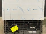 a picture of an air conditioner sitting on top of a metal rack