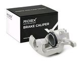 a close up of a brake caliper in front of a box