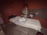 a massage table with towels on it in a room