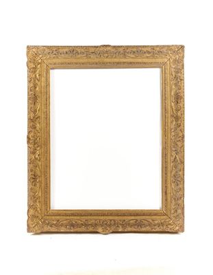 a gold frame with a white background and a white wall