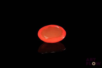 an image of a red object on a black surface