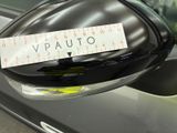a sticker on the side mirror of a car that says vpauto