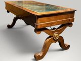 an image of a wooden table with a glass top on a stand