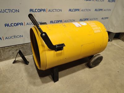 une image représentant un fût jaune posé sur un sol en béton