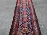 a long rug on the ground in a parking lot