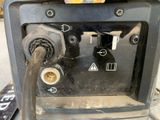 a close up of a gas pump with a hose attached to it