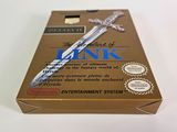 an image of a box with a sword in it sitting on a table