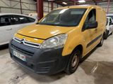 yellow citrole van parked in a garage next to other cars