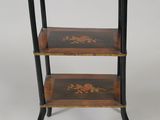 an image of a three tiered wooden shelf with flowers on it