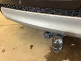 a close up of the front bumper of a car