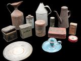 many different types of tins and containers on the table