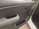 the door handle of a car is open to show the interior