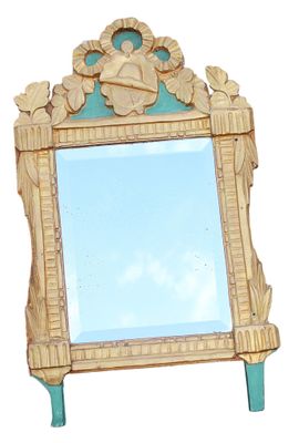un miroir sur lequel est représentée une femme
