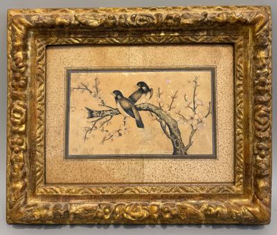 tableau représentant deux oiseaux perchés sur une branche, dans un cadre doré