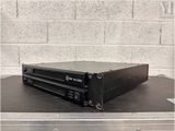 an image of a black amplifier sitting on top of a table