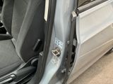 a car door with a latch on the side of it