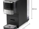a picture of a coffee maker with a coffee cup in it