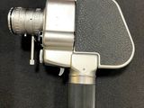 a camera that is sitting on a black surface