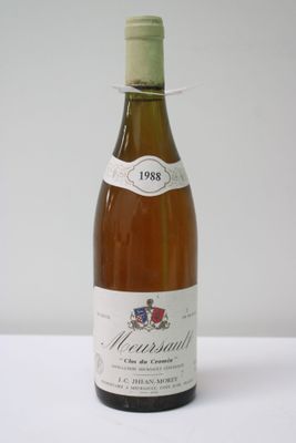 a bottle of wine that is sitting on a table