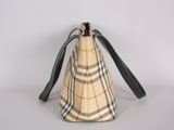 beige and black checkered purse with black leather strap