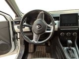 the interior of a car with a steering wheel, dashboard, and dash board