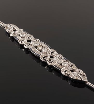 an art deco silver and diamond broochle