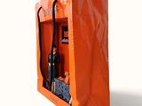 an orange box with a black handle and a black hose