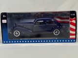 a blue toy car with an american flag on it