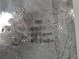 a close up of a metal object on a table