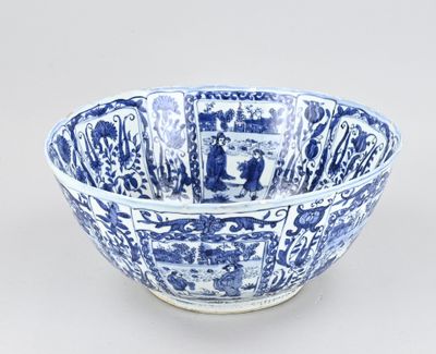 a blue and white bowl with a pattern on the inside of it