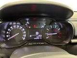 a close up of a car dashboard with a speedometer and gauges