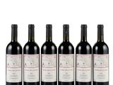 six bottles of red wine are lined up in a row