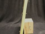 a close up of a piece of wood with a piece of wood sticking out of it