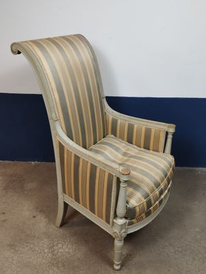 Fauteuil / Bergère Directoire, en bois sculpté et mouluré et…