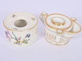 a white and gold tea pot and a white and gold tea pot