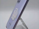 a close up of a cell phone with a sim card attached to it