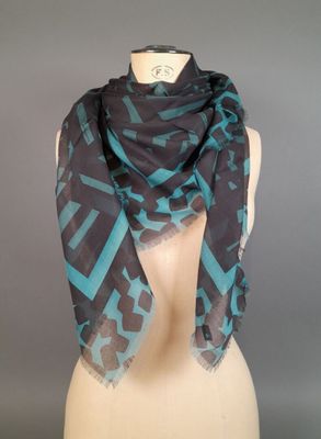 a blue and black scarf on a mannequin mannequin mannequin mannequin mannequin mannequin mannequin mannequin mann