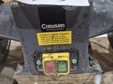 a picture of a close up of a machine with paper on it