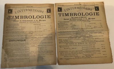 two pages of an old newspaper on a white table