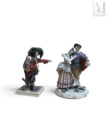 deux figurines d'un homme et d'une femme debout l'un à côté de l'autre