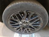 a close up of a tire on a vehicle