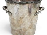 silver plated ice bucket with handles and handles on a white background