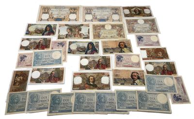 many different types of paper money are arranged on a white surface