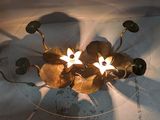 a glass table with a lamp on top of it