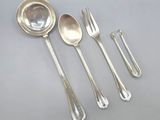 a set of five silverplated spoons and a silver plate
