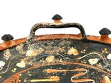 a close up of an old suitcase with a clock on it