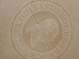 a close up of a box with a logo on it