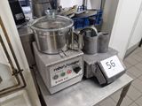 a blender that is sitting on a table in a kitchen