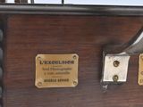 an old fashioned sewing machine on display on a table