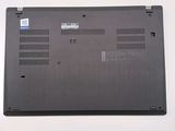 a black laptop that is sitting on a table